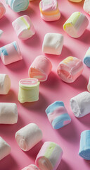 Pastel Colored Marshmallows on a Pink Background
