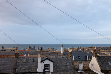 19 February 2024. Cullen,Moray,Scotland. This is the rooftop view of the old seatown village of Cullen with a lot of chimneys and roofing slates.