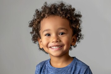 Professional studio portrait of a mixed-race boy with a radiant smile Showcasing diversity and joy in childhood Perfect for advertising and educational materials