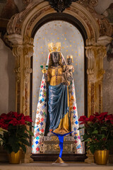 The Sanctuary of Oropa (Italian: santuario di Oropa) is a Marian sanctuary dedicated to the Black Madonna (madonna nera) in the municipality of Biella, Piedmont, Italy. - obrazy, fototapety, plakaty