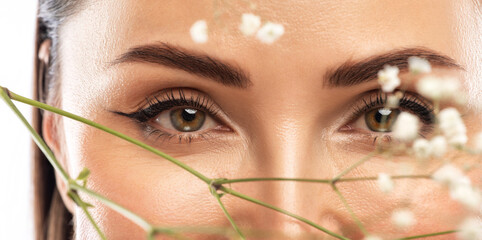 The make-up artist does Long-lasting styling of the eyebrows and makes the procedure of lamination...