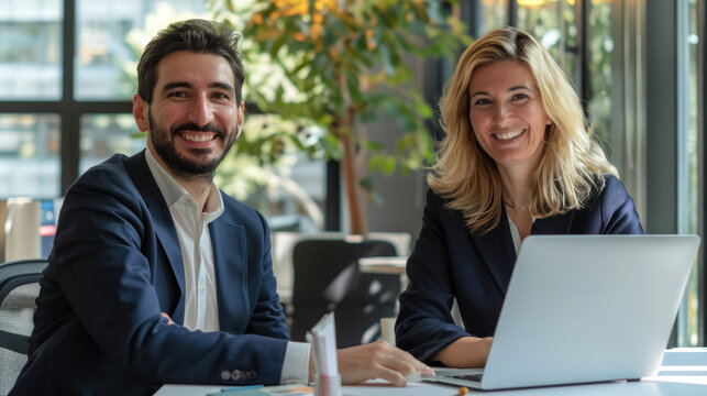 A Mature, Happy and Confident Businesswoman Next to a Young Man in the Office. She Represents a Diverse Team of Corporate Managers and Collaborates Seamlessly as Executive Colleagues. Generative AI.