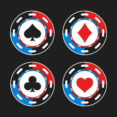 Four vibrant poker chips adorned with the suits of playing cards spades, diamonds, clubs, and hearts isolated on dark background. Chips feature classic design, play in games like poker and blackjack