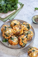 Vegetarian egg muffins with mushroom, kale and feta cheese for Breakfast