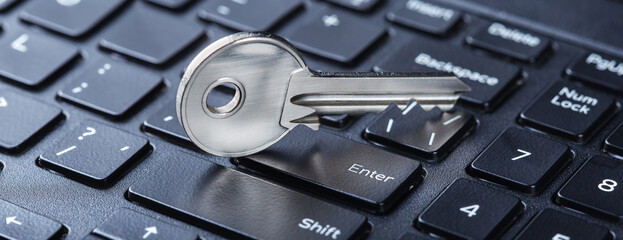 phishing, hacking personal data and money , key and hook on computer keyboard.