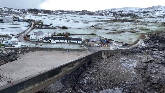 Aerial view ofa snow covered Portnoo harbour in County Donegal, Ireland.