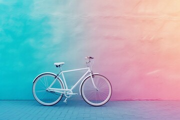 White bicycle on colorful wall background.