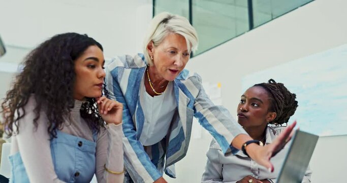 Business people, mentor and consulting in office with laptop for creative review, collaboration or coaching. Teamwork, employees and designer with feedback, instructions or communication at workplace