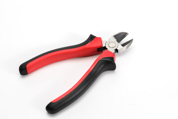 Metal cutting pliers with sharp tip on white background.
