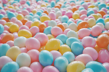 endless easter vibrant eggs painted in blue and purple colors symbolisising celebration and joyful experience. Used for wallpaper of colorful eggs