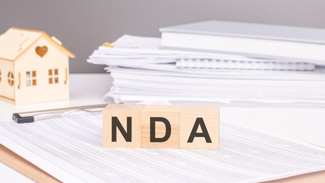 wooden toy blocks with the text: nda
