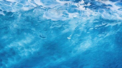 Fototapeta na wymiar Soothing Blue Water Surface with Gentle Waves and Bubbles in Tranquil Setting