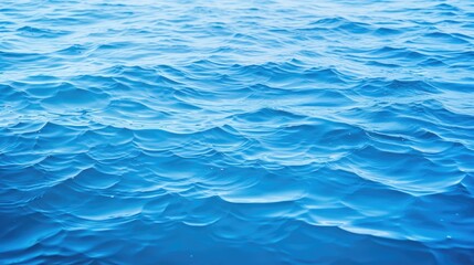 Naklejka premium Tranquil Blue Water Surface Reflecting Serenity with Gentle Rippled Waves