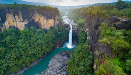 Fototapeta na wymiar Beautiful waterfall tropical forest in the mountains.