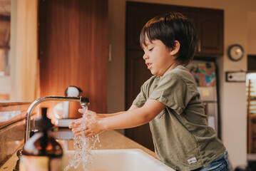 Child washing hands