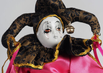 Italian Porcelain doll depicting the hero of the Commedia Del Arte Harlequin. - 740303205
