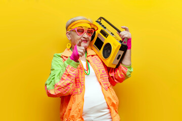I choose you. funny granny in hipster clothes listening to music on tape recorder and pointing at...