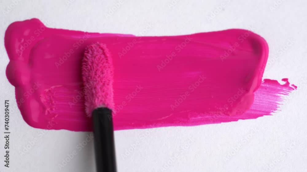 Wall mural pink lipstick, lip gloss texture in trendy deep pink color smear smudge swatch sample. pink lipgloss