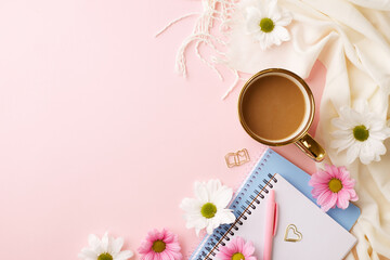 International Women's Day: a touch of elegance. Top view shot of pink paper hearts, notepad with a pen, flowers, coffee cup on pink background with space for messages and dedications