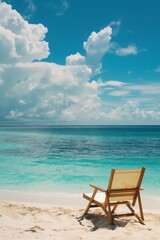 Fototapeta na wymiar chair on the beach with blue sky
