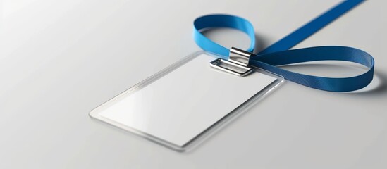 Elegant blue ribbon tied around a shiny silver metal id badge for professional use