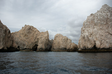 View of the Arch in Los Cabos, Baja California, Mexico. The Cabo Arch on a cloudy winter day.