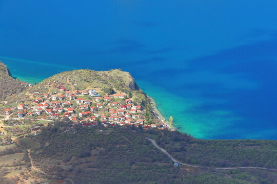 Westwards view from Galicica Mountain lookout on Koritski Rid over Trpejca village and Lake Ohrid's turquoise blue waters. North Macedonia-297