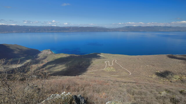 Westwards view from Galicica Mountain lookout on Koritski Rid over Trpejca village and Lake Ohrid's turquoise blue waters. North Macedonia-296