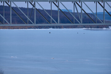 Vanino, Russia - Jan 18, 2021: Vanino Bay in the Tatar Strait in winter. The frozen sea.