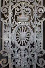 corroded wrought metal fence closeup