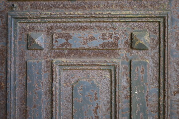 corroded wrought metal fence closeup