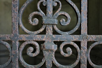 corroded wrought metal fence closeup