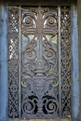 close up ancient weathered wrought metal  ornaments 