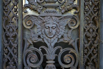 close up ancient weathered wrought metal  ornaments 