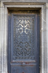 close up ancient weathered wrought metal  ornaments 