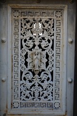 close up ancient weathered wrought metal  ornaments 