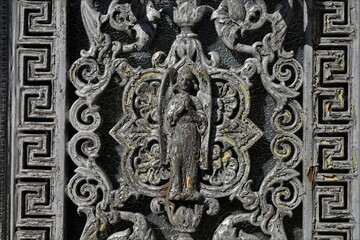 old weathered wrought metal ornaments