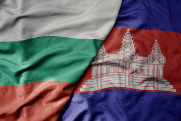 big waving national colorful flag of cambodia and national flag of bulgaria .
