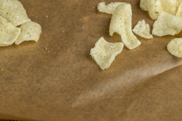 crispy potato chips with spices on the table