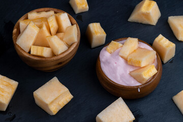 creamy yogurt with melon flavor and chunks