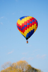 hot air balloons floating over southern Utah desert