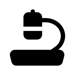 microscope glyph icon