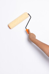 Decorator's hand painting wall with roller