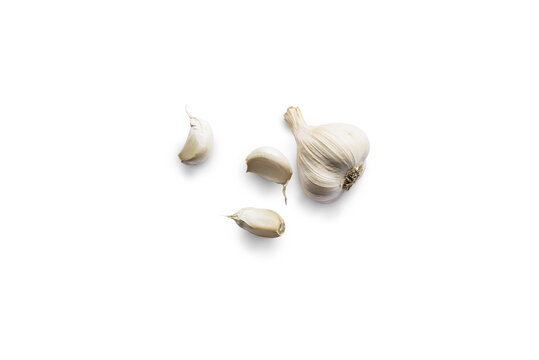Clove of white garlic seen from above on a transparent background with shadow from above, top view, png