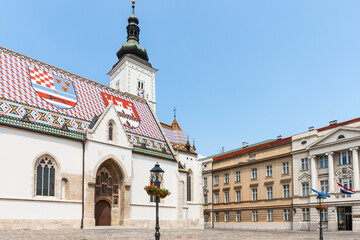 Croatian Parliament Building  and St Mark's church on Saint Mark`s Square, Zagreb, Croatia