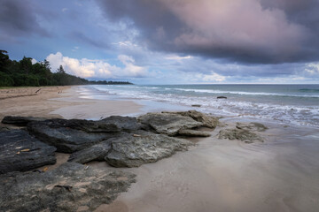 Rocks and white sand beach at the scenic coast of tropical Little Andaman islands in India