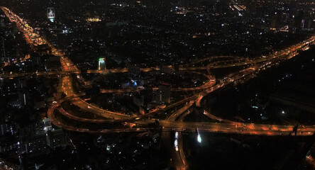 sky high building Glowing expressway in Bangkok at night