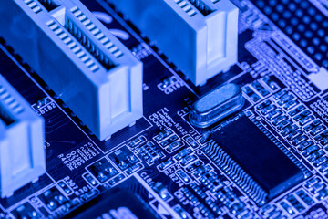 computer circuit board with sockets and chips. electronic components closeup.