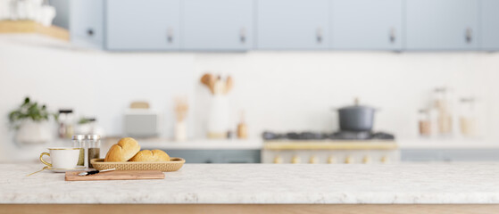 A copy space for display your product on a kitchen tabletop in a cozy minimal kitchen.