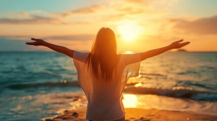 Backlit Portrait of calm happy smiling free woman with open arms and closed eyes enjoys a beautiful moment life on the seashore at sunset	 - obrazy, fototapety, plakaty